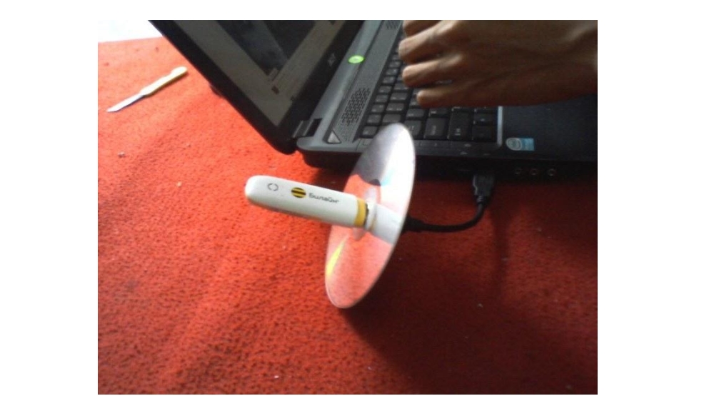 Menggunakan CD sebagai Penguat Sinyal Modem